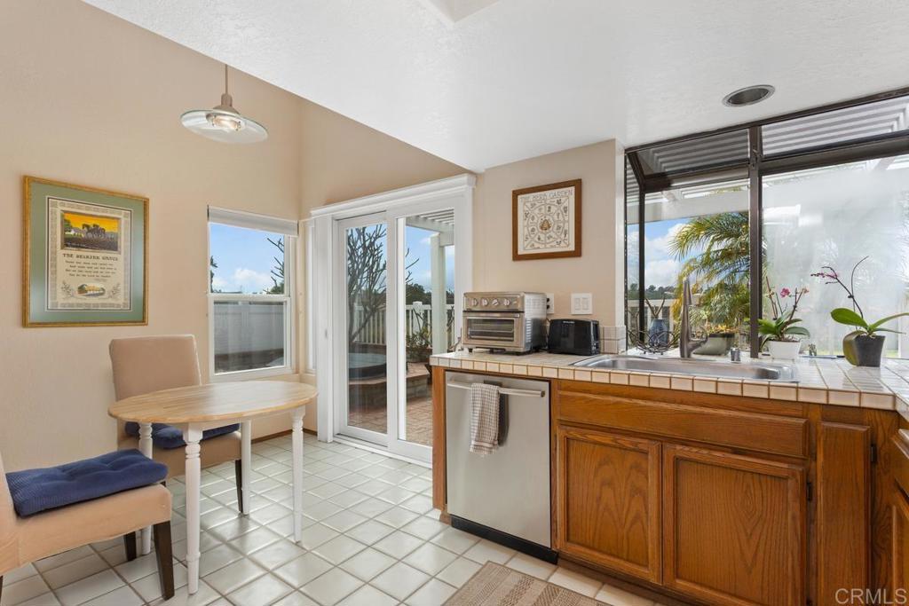 1570 Pacific Ranch Drive Encinitas, CA 92024 - Photo 11 of 35 a room with a sink furniture and a large window