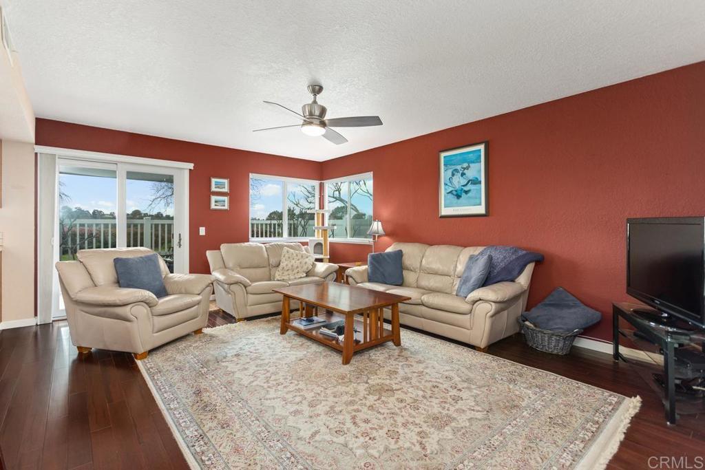 1570 Pacific Ranch Drive Encinitas, CA 92024 - Photo 13 of 35 a living room with furniture and a flat screen tv