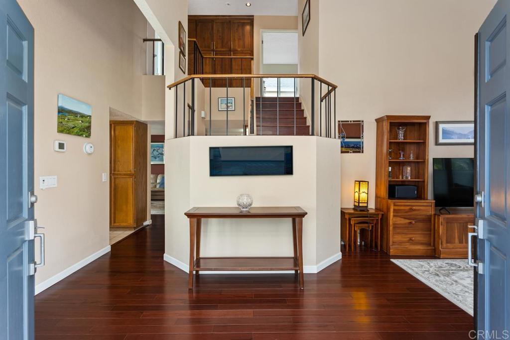 1570 Pacific Ranch Drive Encinitas, CA 92024 - Photo 4 of 35 a view of a livingroom with furniture and wooden floor