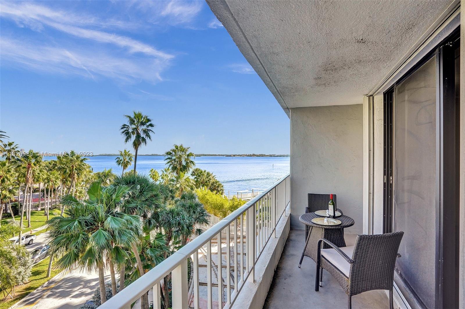 200 Southeast 15th Road, Unit 6I Miami, FL 33129 - Photo 2 of 50 a view of a balcony with chairs