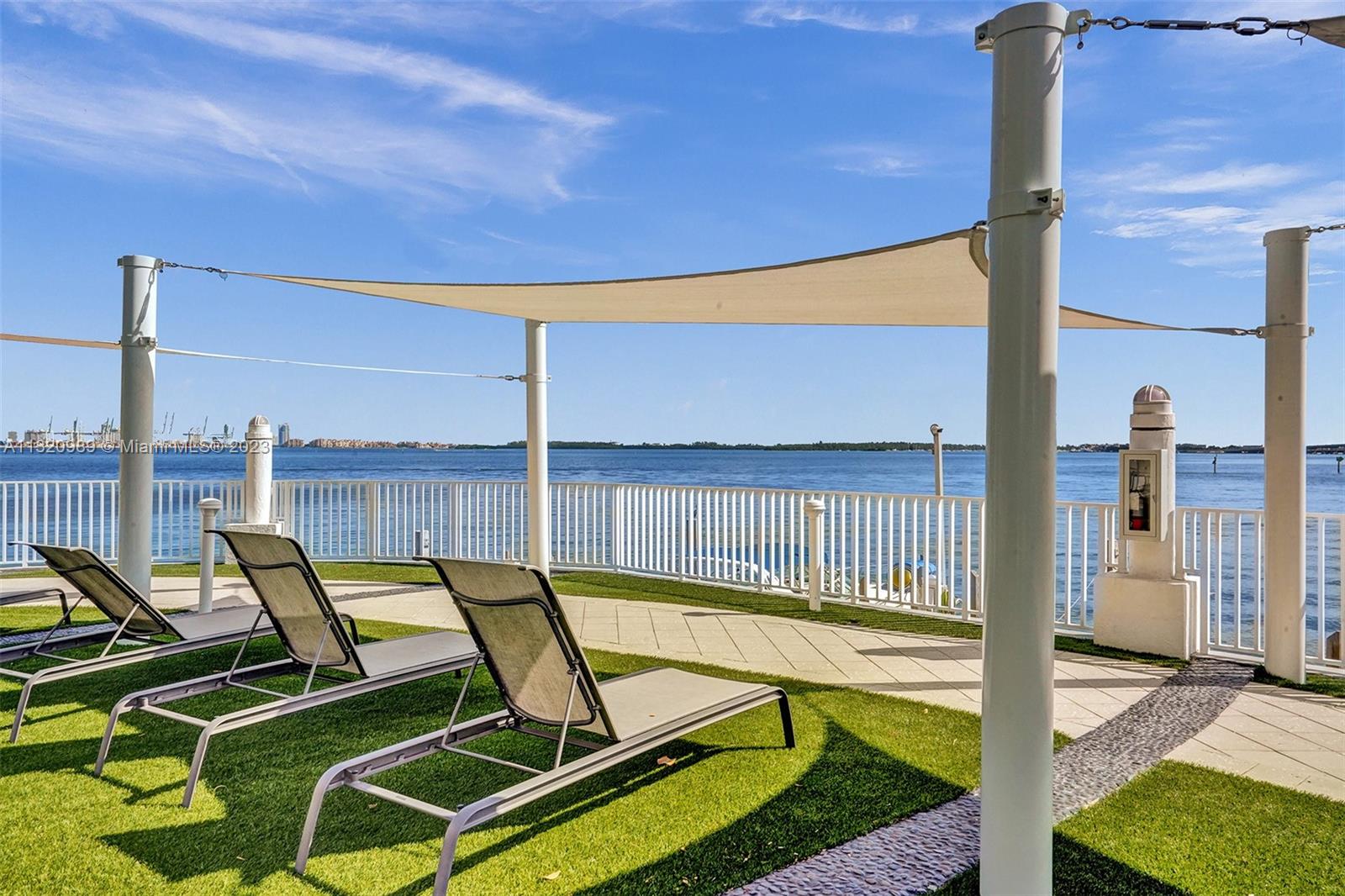 200 Southeast 15th Road, Unit 6I Miami, FL 33129 - Photo 37 of 50 a view of a balcony with chairs