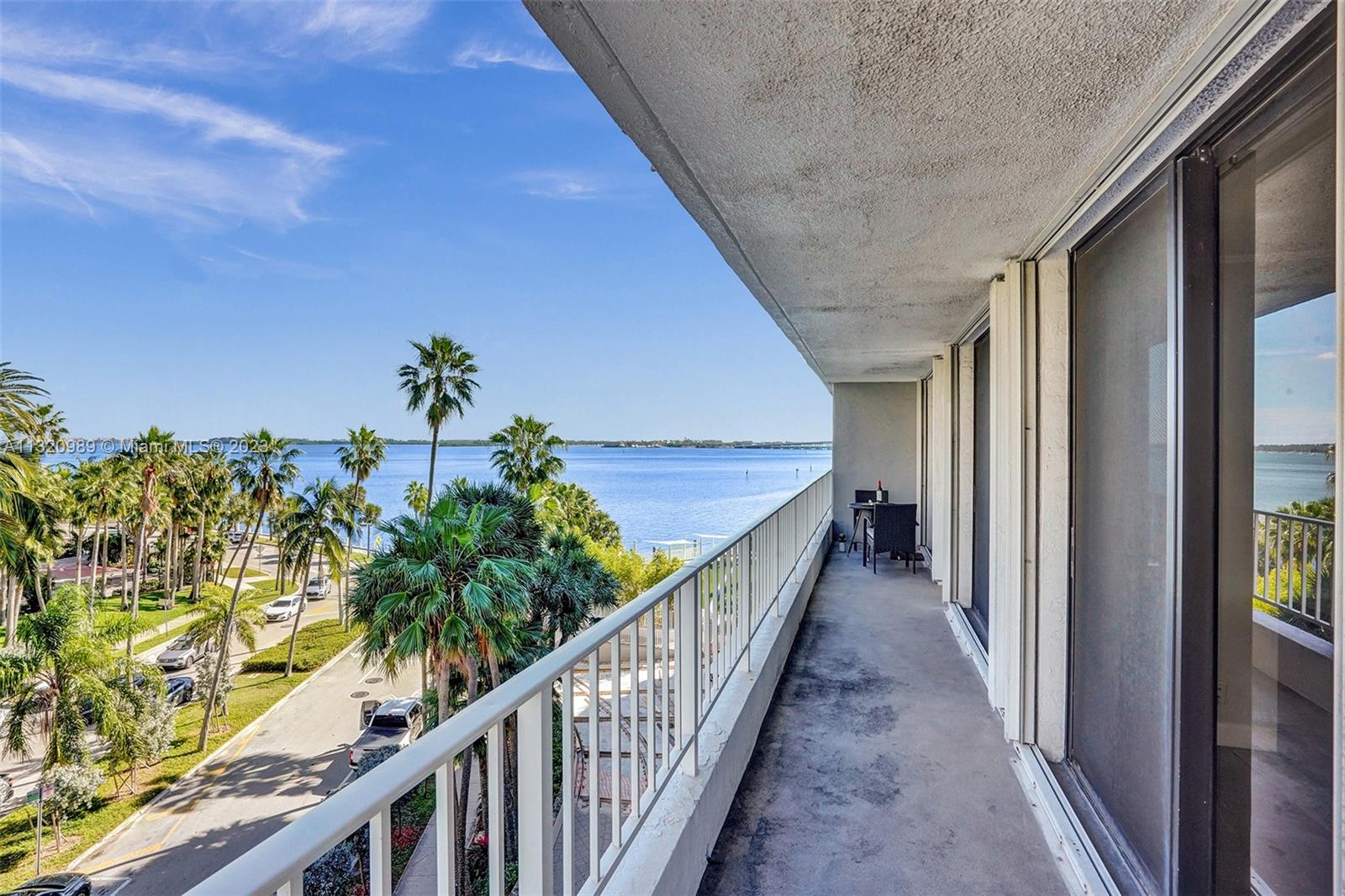 200 Southeast 15th Road, Unit 6I Miami, FL 33129 - Photo 46 of 50 a view of a balcony with wooden floor