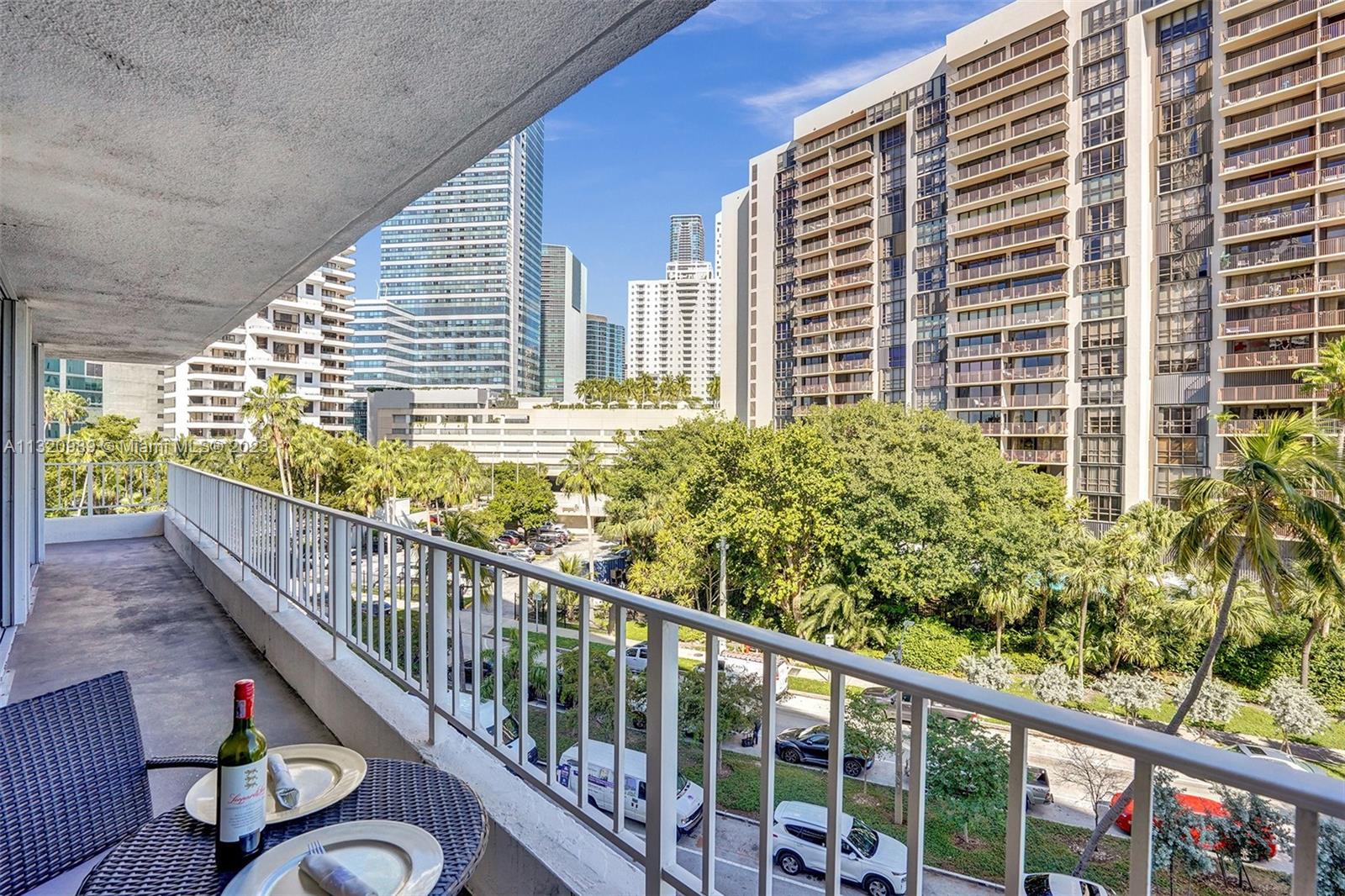 200 Southeast 15th Road, Unit 6I Miami, FL 33129 - Photo 50 of 50 a view of a balcony with chairs