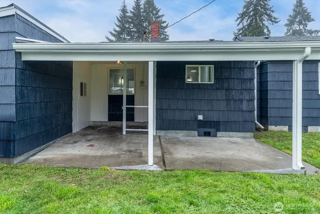 a front view of a house with a garage