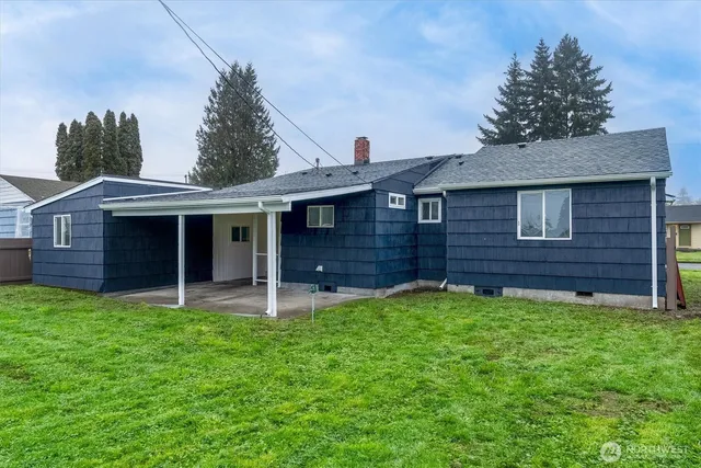 front view of a house with a yard