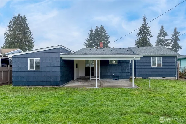 front view of a house with a yard