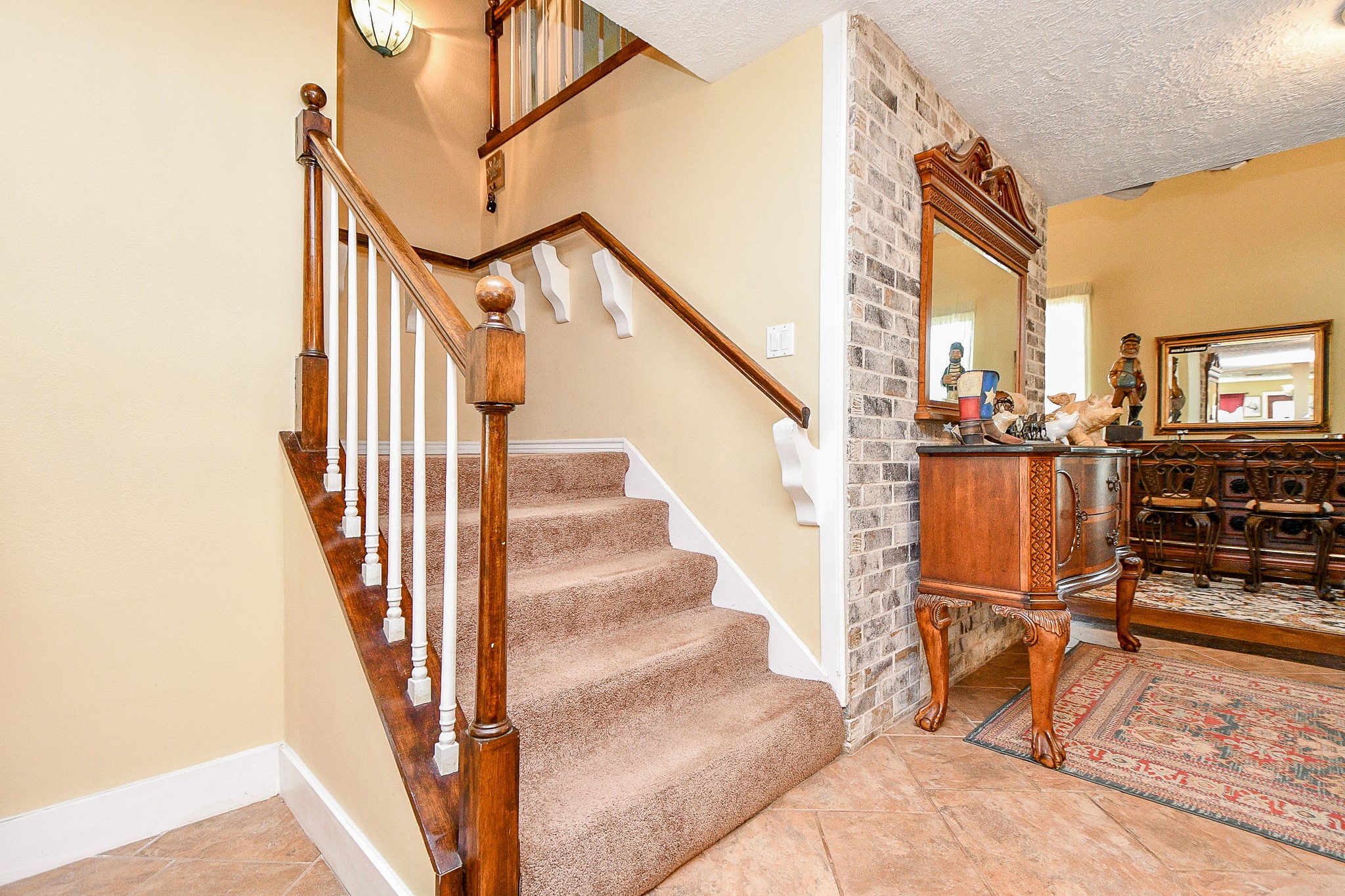 618 Keith Avenue Houston, TX 77504 - Photo 19 of 43 a view of a living room with wooden floor and stairs
