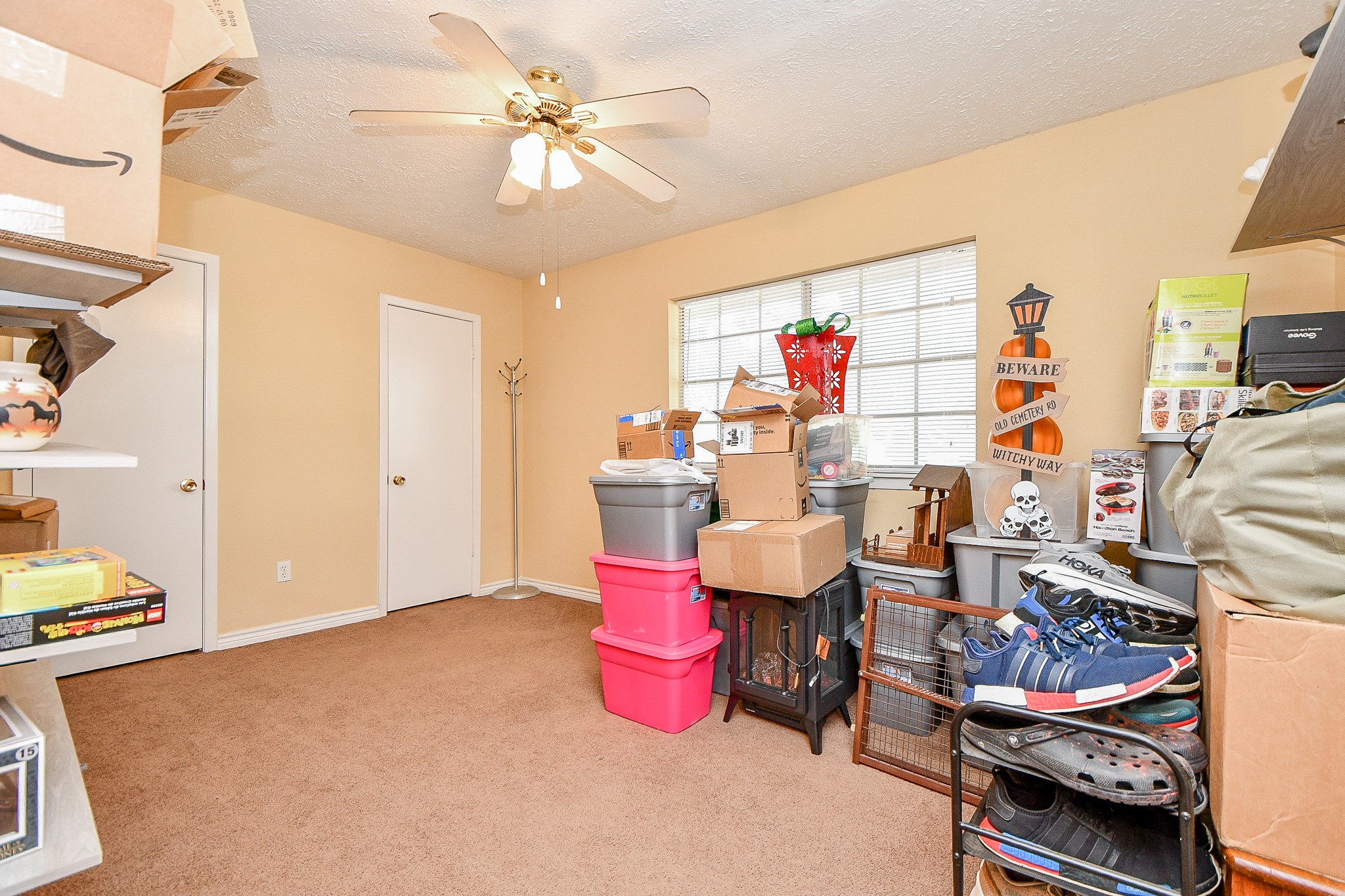 618 Keith Avenue Houston, TX 77504 - Photo 21 of 43 a living room with lots of furniture and a chandelier