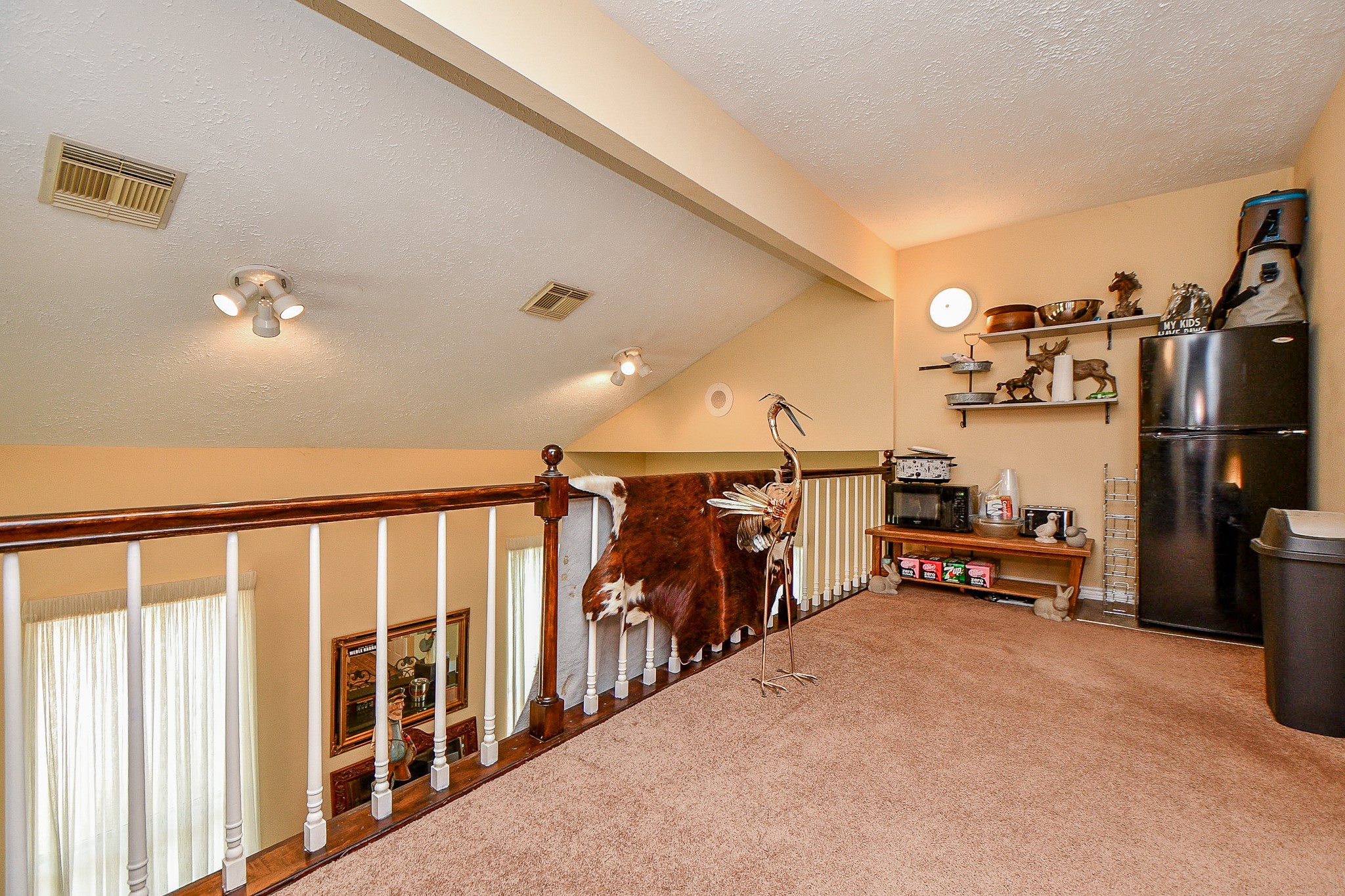 618 Keith Avenue Houston, TX 77504 - Photo 23 of 43 a view of a hallway with a view of staircase
