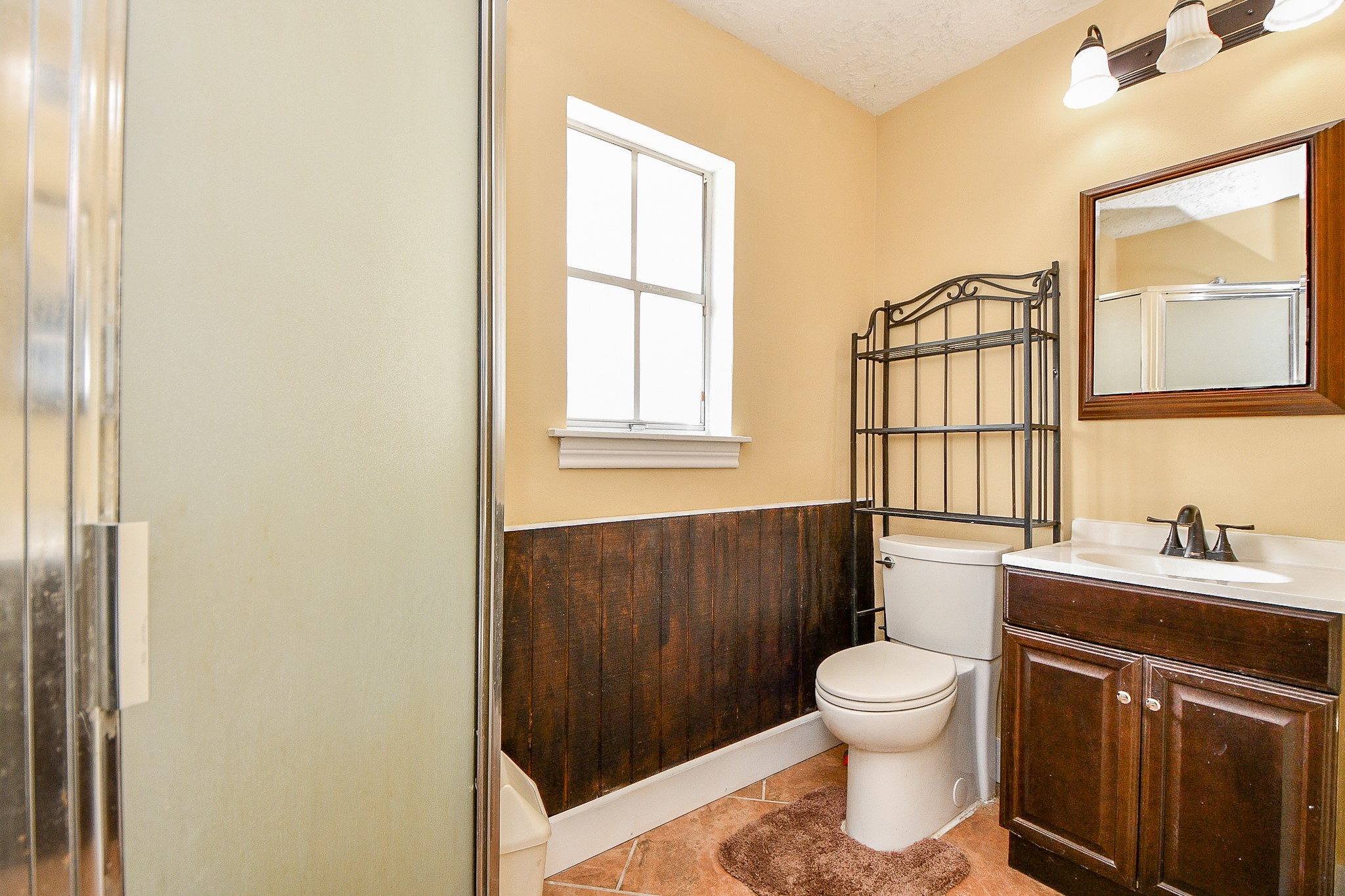 618 Keith Avenue Houston, TX 77504 - Photo 27 of 43 a bathroom with a sink toilet and window