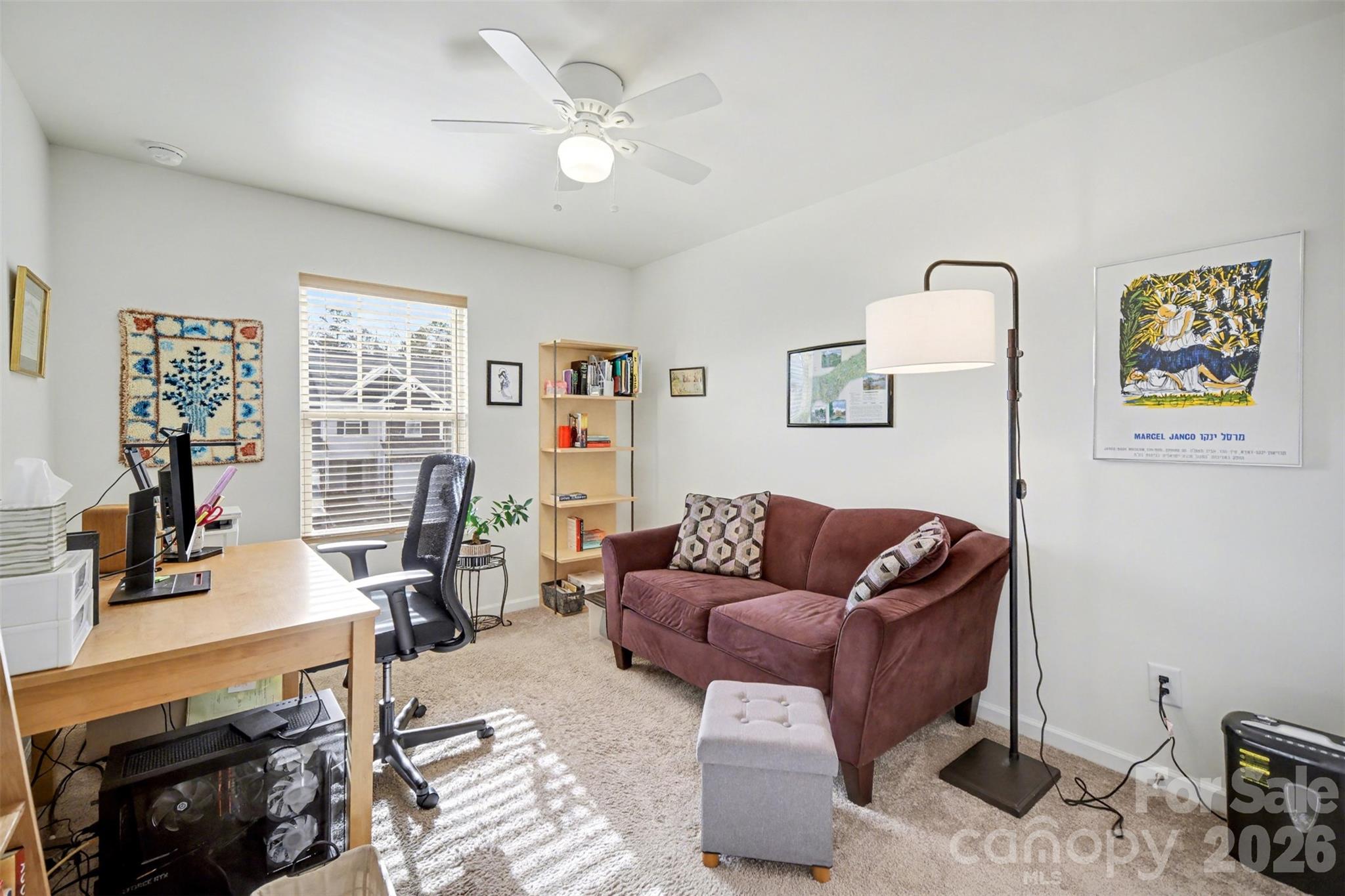 226 Quinn Road Matthews, NC 28104 - Photo 25 of 30 a living room with furniture and a flat screen tv