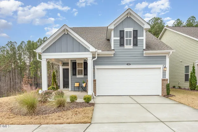 a view of a balcony with chairs