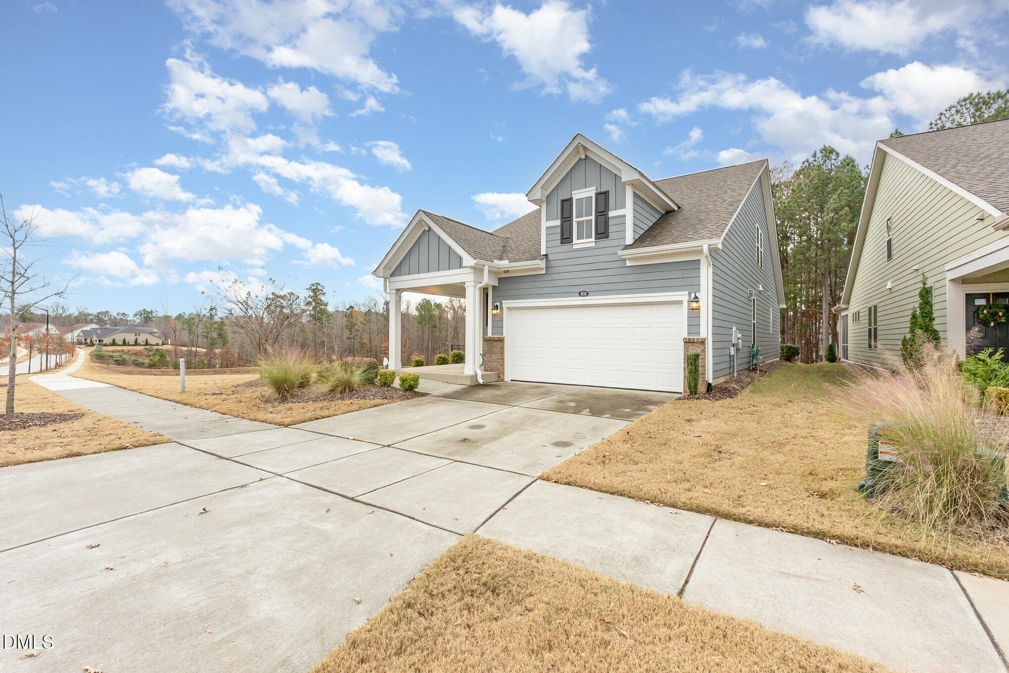 608 Atticus Way Durham, NC 27703 - Photo 27 of 30 a front view of a house with a yard