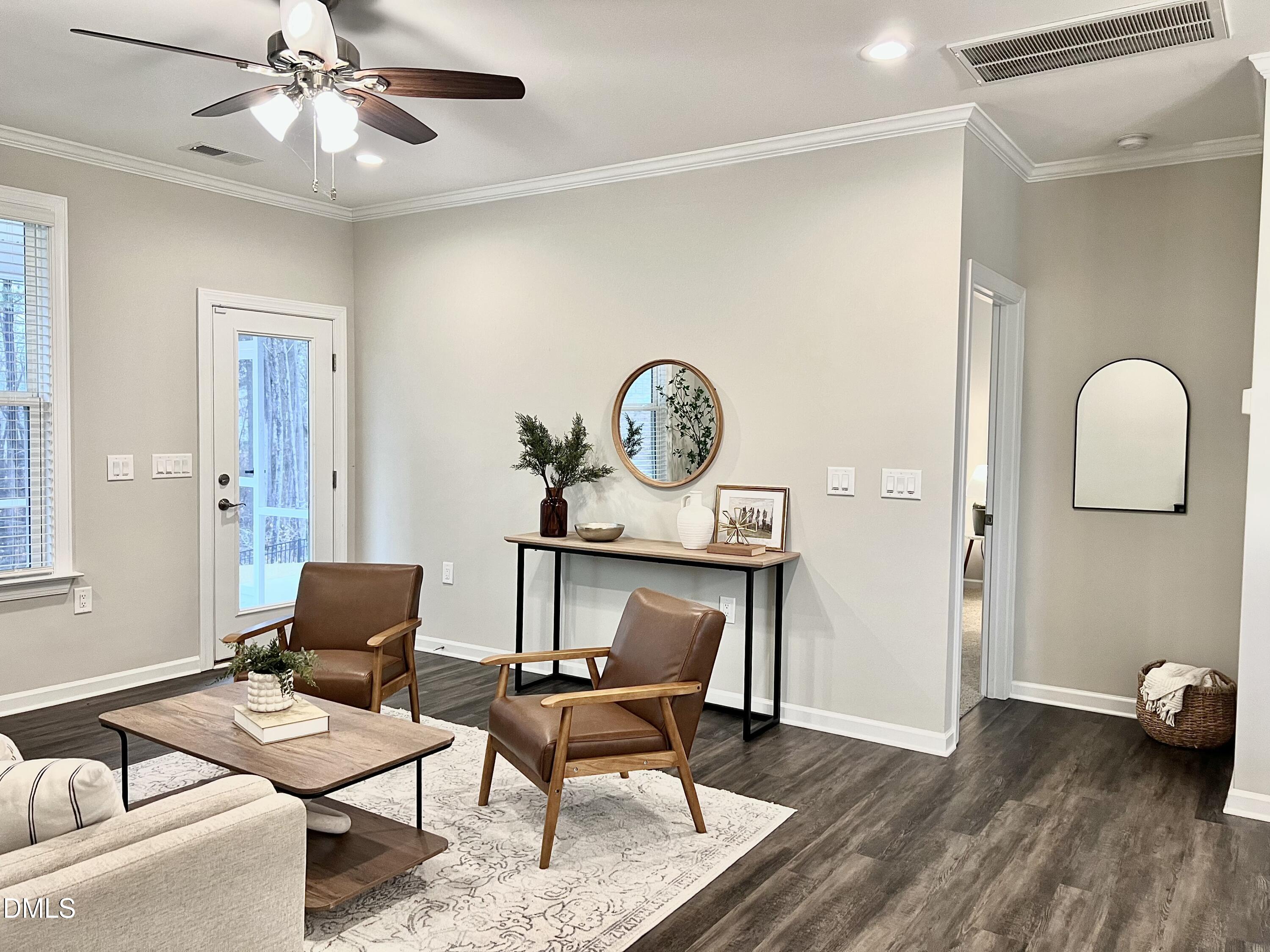 608 Atticus Way Durham, NC 27703 - Photo 8 of 30 a living room with furniture a rug and a window