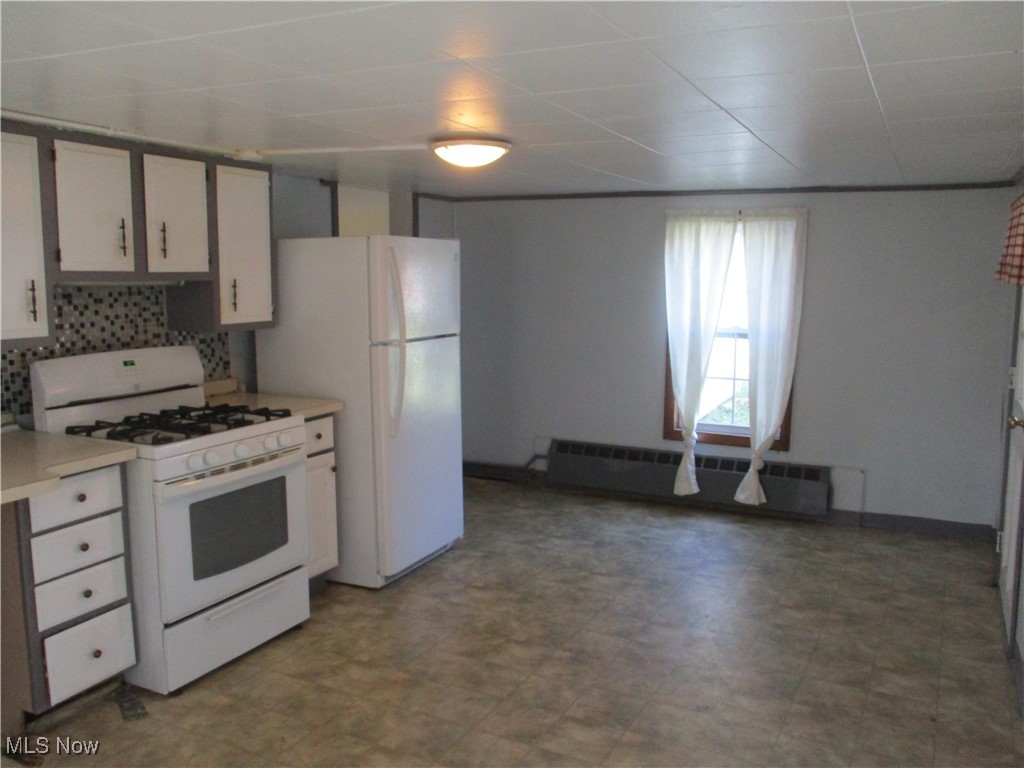 15401 A Madison Road Middlefield, OH 44062 - Photo 7 of 17 Walk thru pantry leads to basement