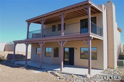 1118 South Riparian Avenue Tucson, AZ 85748 - Photo 2 of 13 a front view of a house