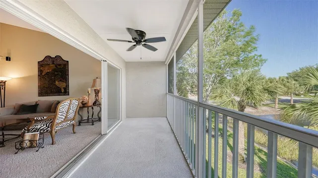 a dining room with stainless steel appliances kitchen island a table and chairs