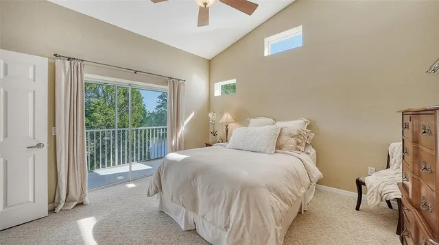a en suite bathroom with a double vanity sink mirror and shower
