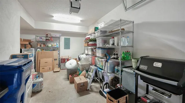 a sign that is sitting in front of flowers