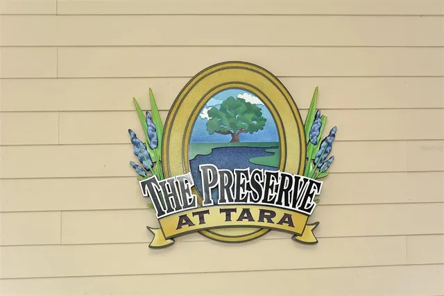 a view of a chair and table in the patio