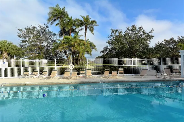 a very nice looking dining room with furniture window and outside view