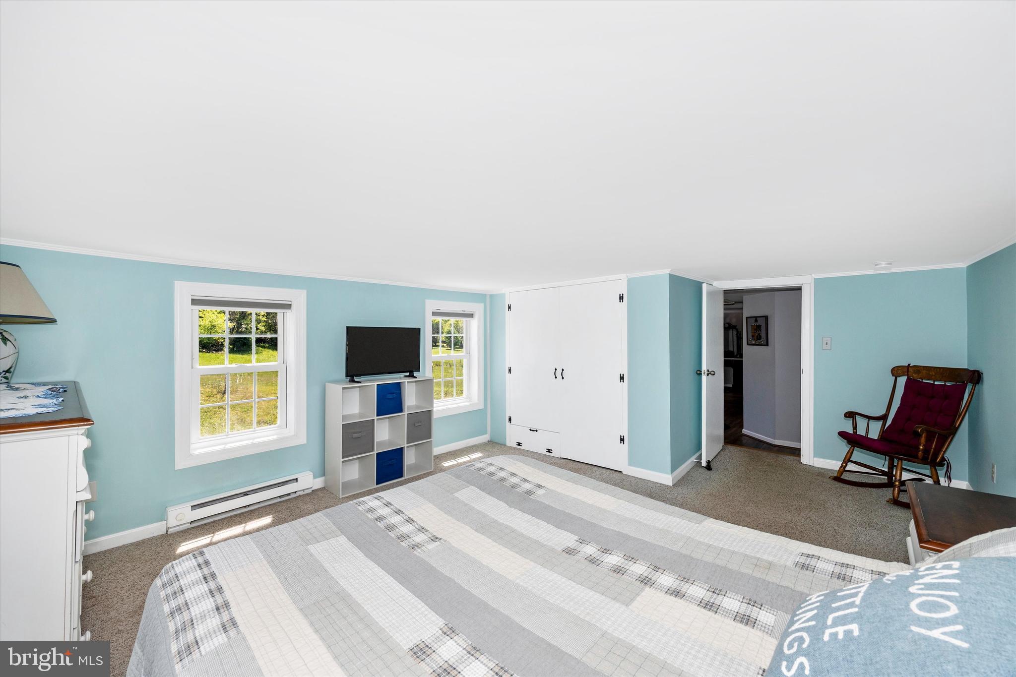 3204 Bidle Road Middletown, MD 21769 - Photo 12 of 23 a bedroom with a bed and a chair