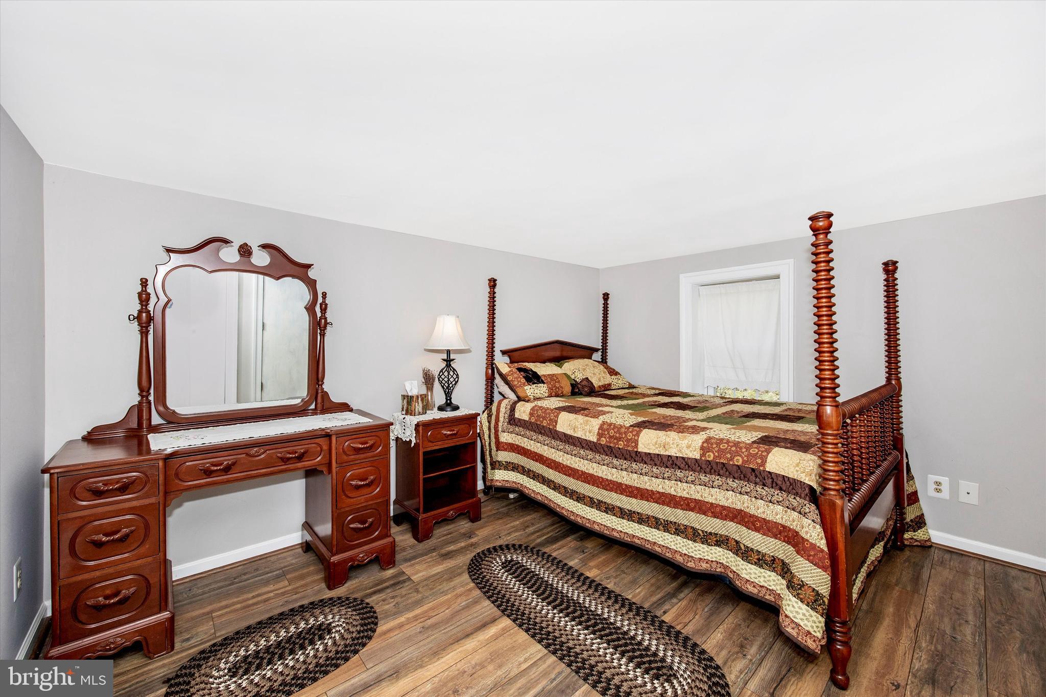 3204 Bidle Road Middletown, MD 21769 - Photo 14 of 23 a bedroom with a bunk bed and a dresser