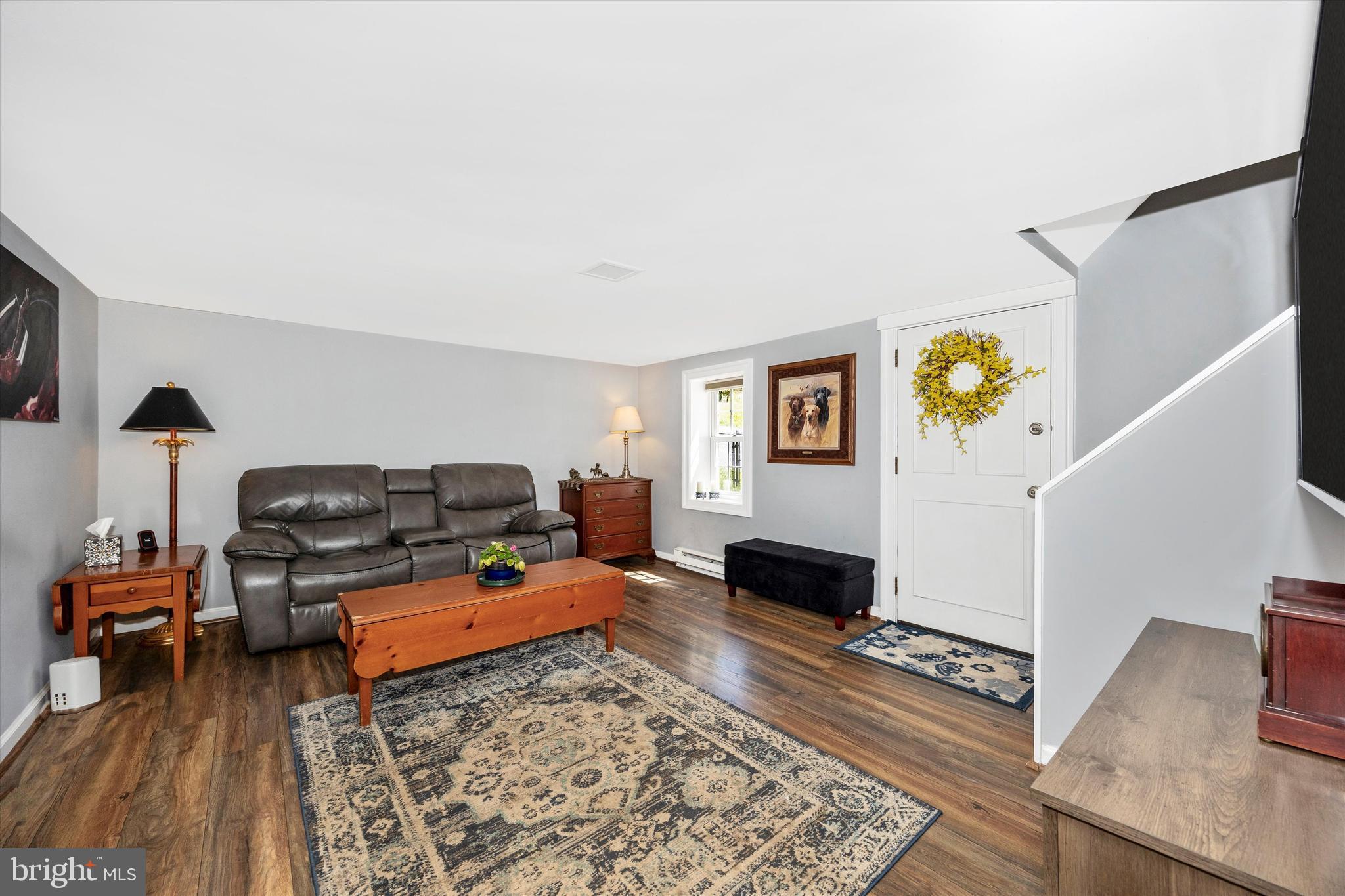3204 Bidle Road Middletown, MD 21769 - Photo 2 of 23 a living room with furniture and a couch