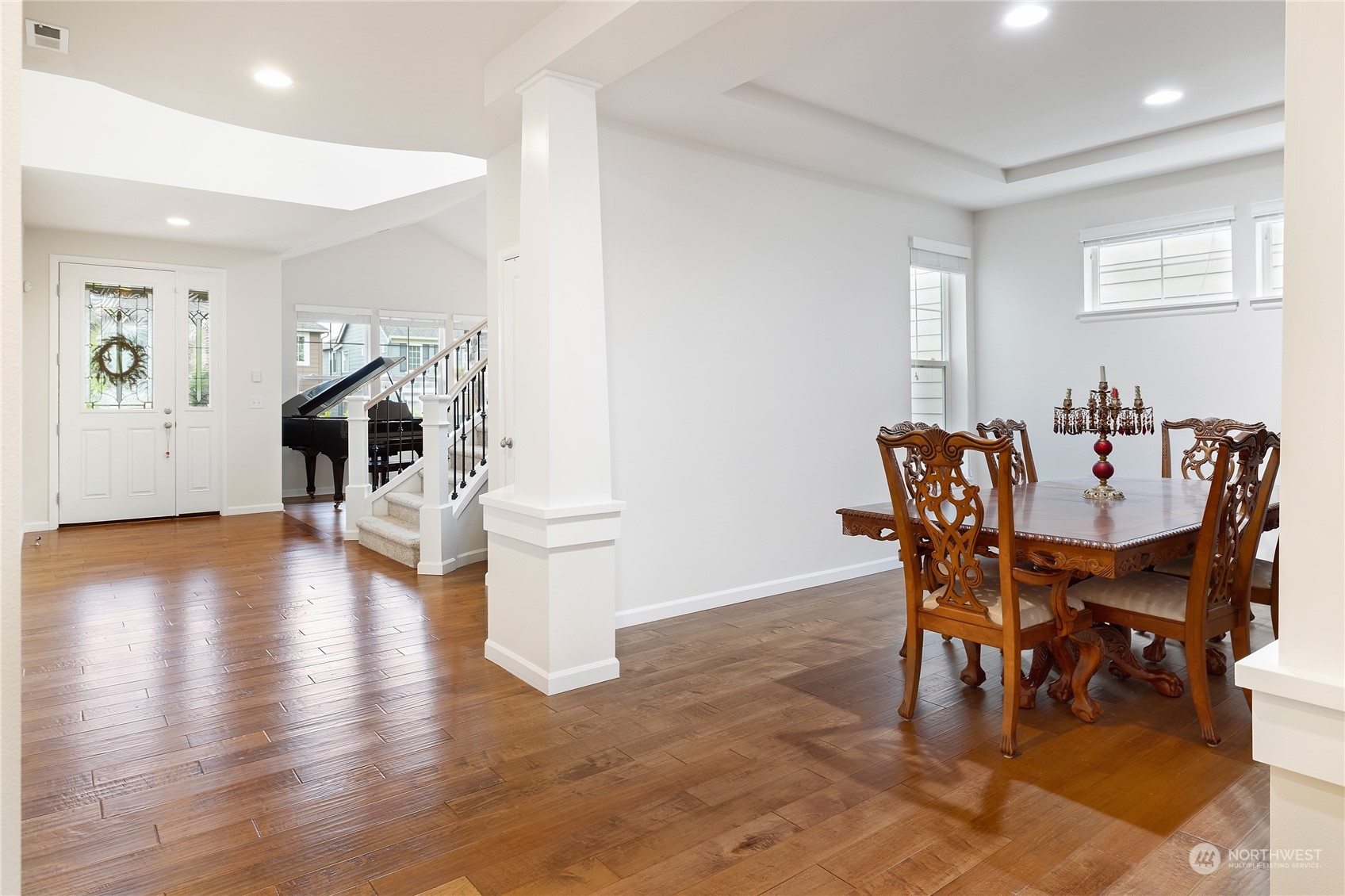 16224 Southeast 138th Place Renton, WA 98059 - Photo 11 of 40 a view of a dining room with furniture and wooden floor