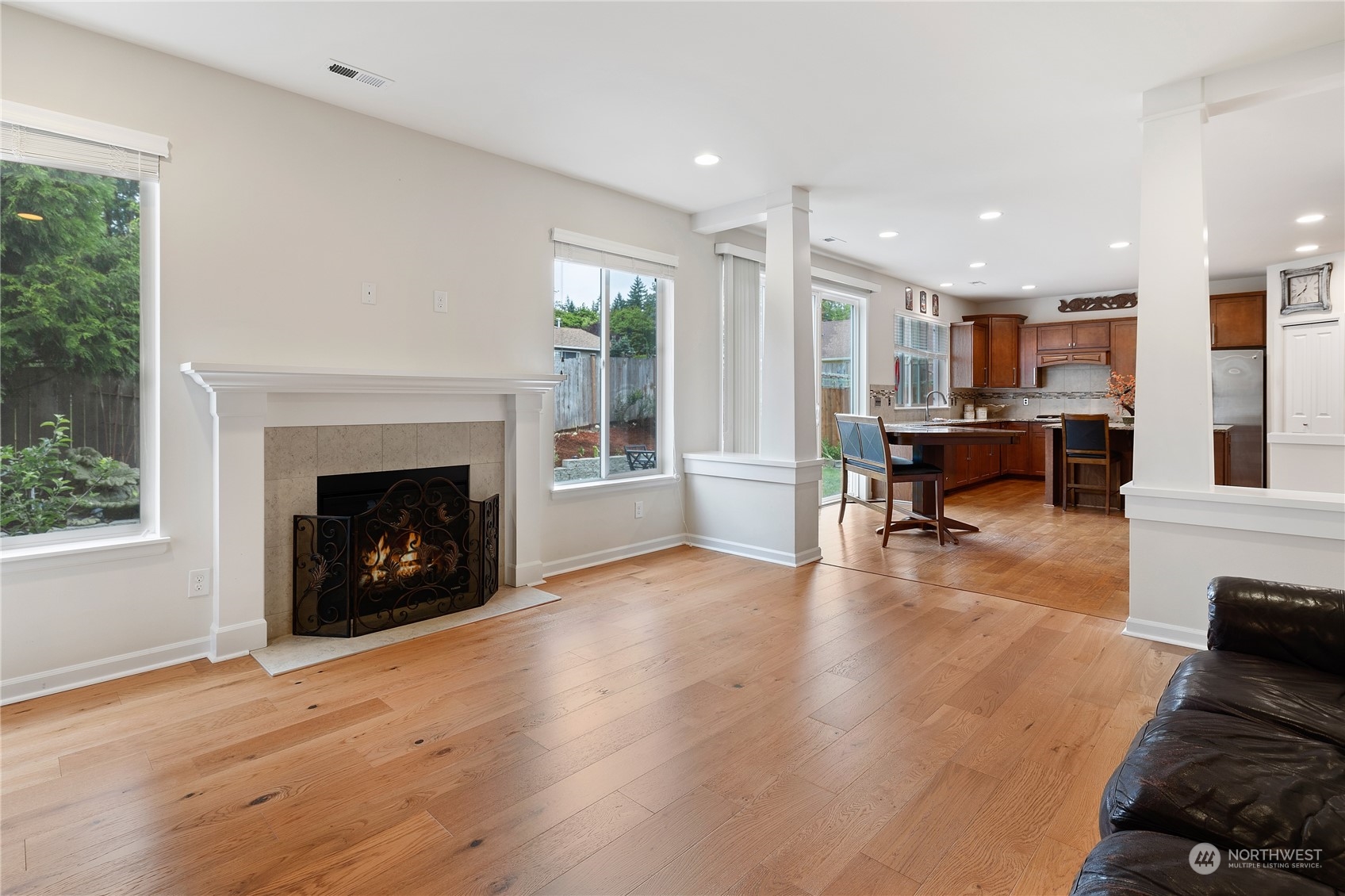 16224 Southeast 138th Place Renton, WA 98059 - Photo 12 of 40 a living room with furniture and a fireplace