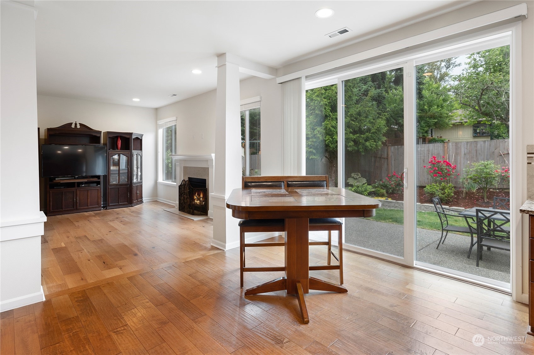 16224 Southeast 138th Place Renton, WA 98059 - Photo 14 of 40 a living room with furniture and a fireplace