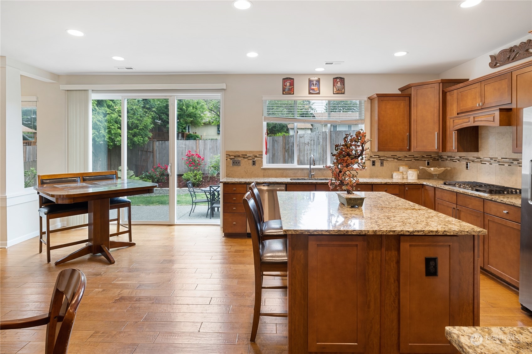 16224 Southeast 138th Place Renton, WA 98059 - Photo 18 of 40 a kitchen with counter top space a sink and cabinets