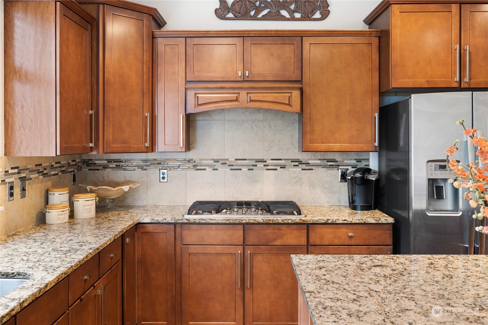 16224 Southeast 138th Place Renton, WA 98059 - Photo 19 of 40 a kitchen with stainless steel appliances granite countertop a sink stove and cabinets