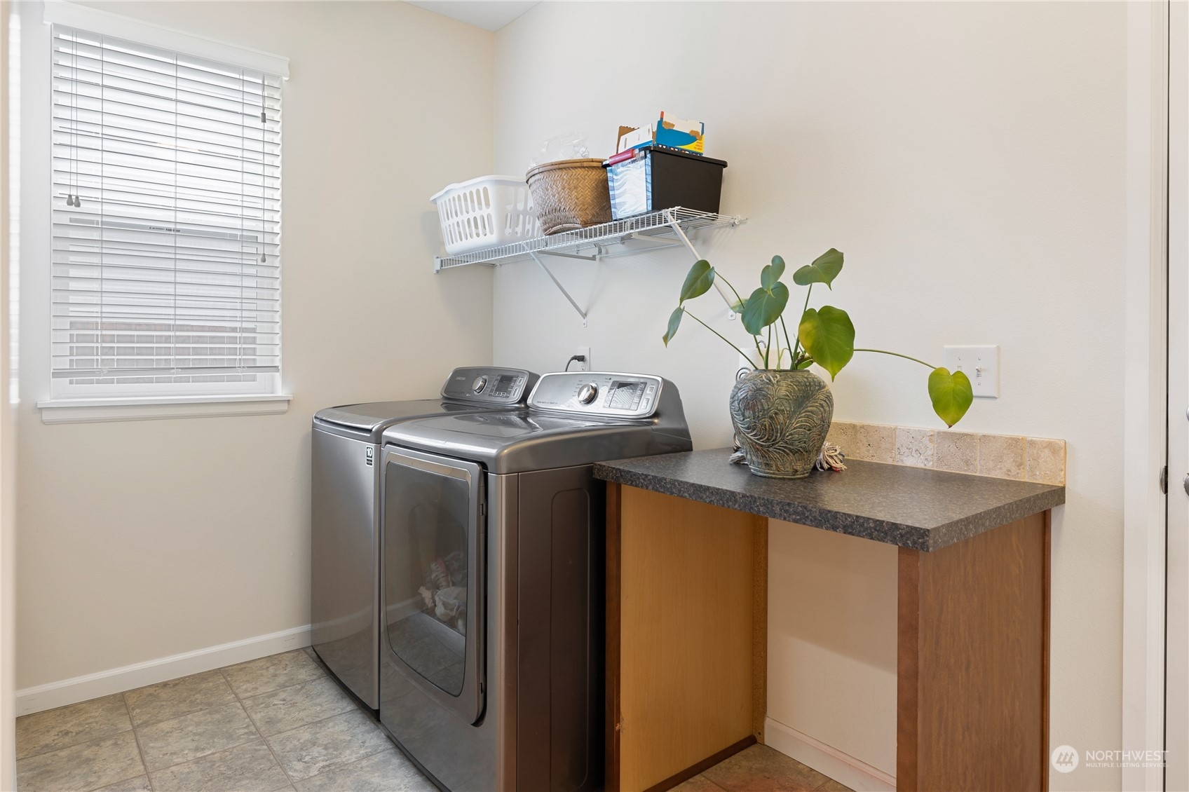 16224 Southeast 138th Place Renton, WA 98059 - Photo 20 of 40 a utility room with dryer and washer