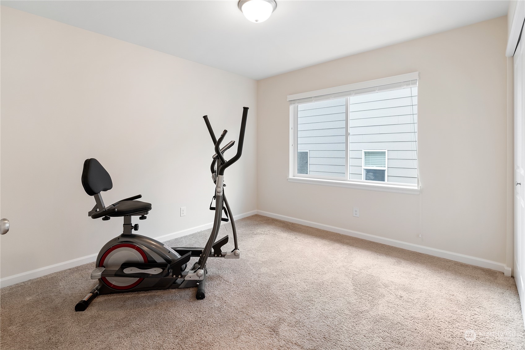 16224 Southeast 138th Place Renton, WA 98059 - Photo 21 of 40 a view of a room with gym equipment