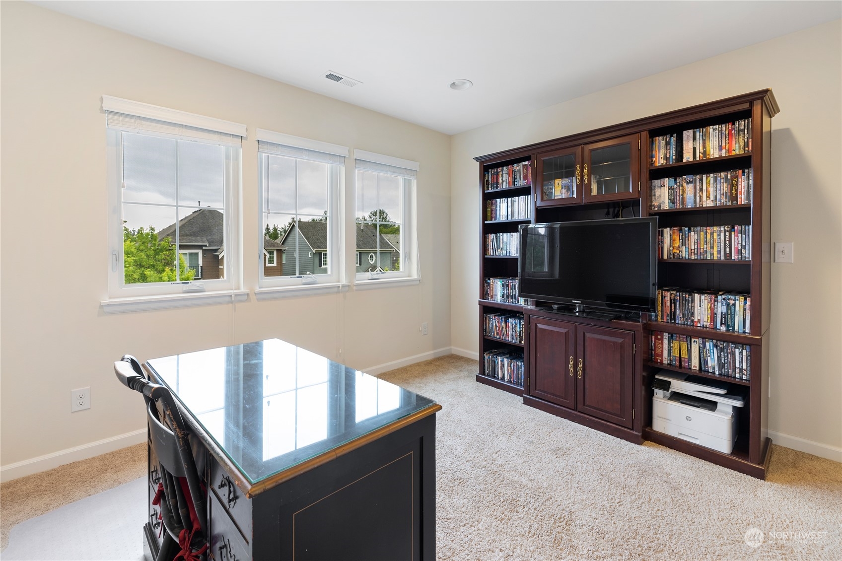 16224 Southeast 138th Place Renton, WA 98059 - Photo 25 of 40 a living room with furniture and a flat screen tv