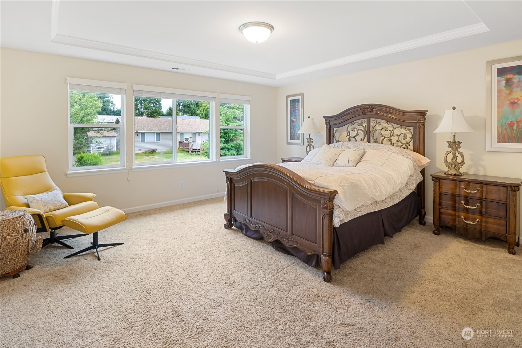 16224 Southeast 138th Place Renton, WA 98059 - Photo 26 of 40 a bedroom with a bed and a large window