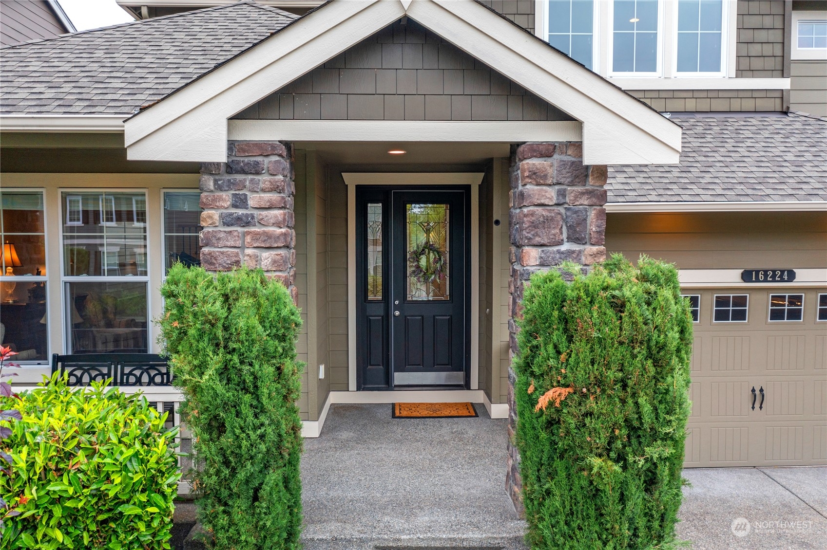 16224 Southeast 138th Place Renton, WA 98059 - Photo 3 of 40 a front view of a house with garden