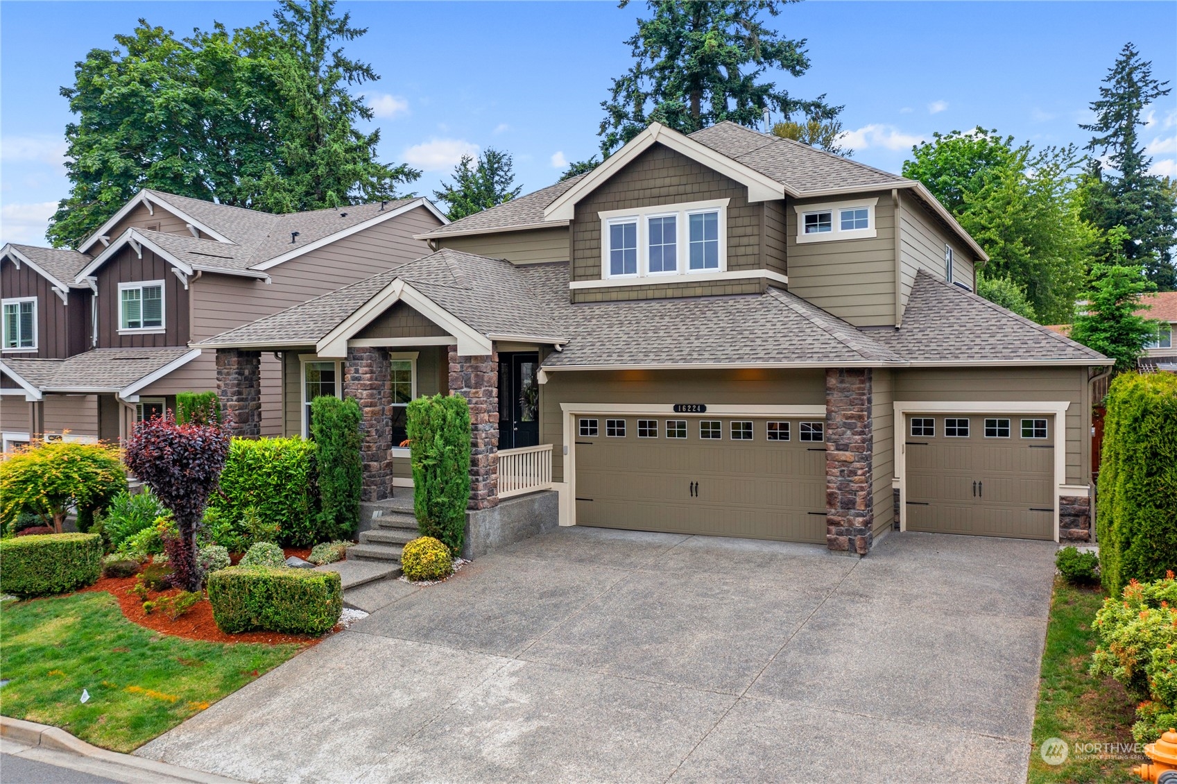 16224 Southeast 138th Place Renton, WA 98059 - Photo 39 of 40 a view of a house with a yard and plants