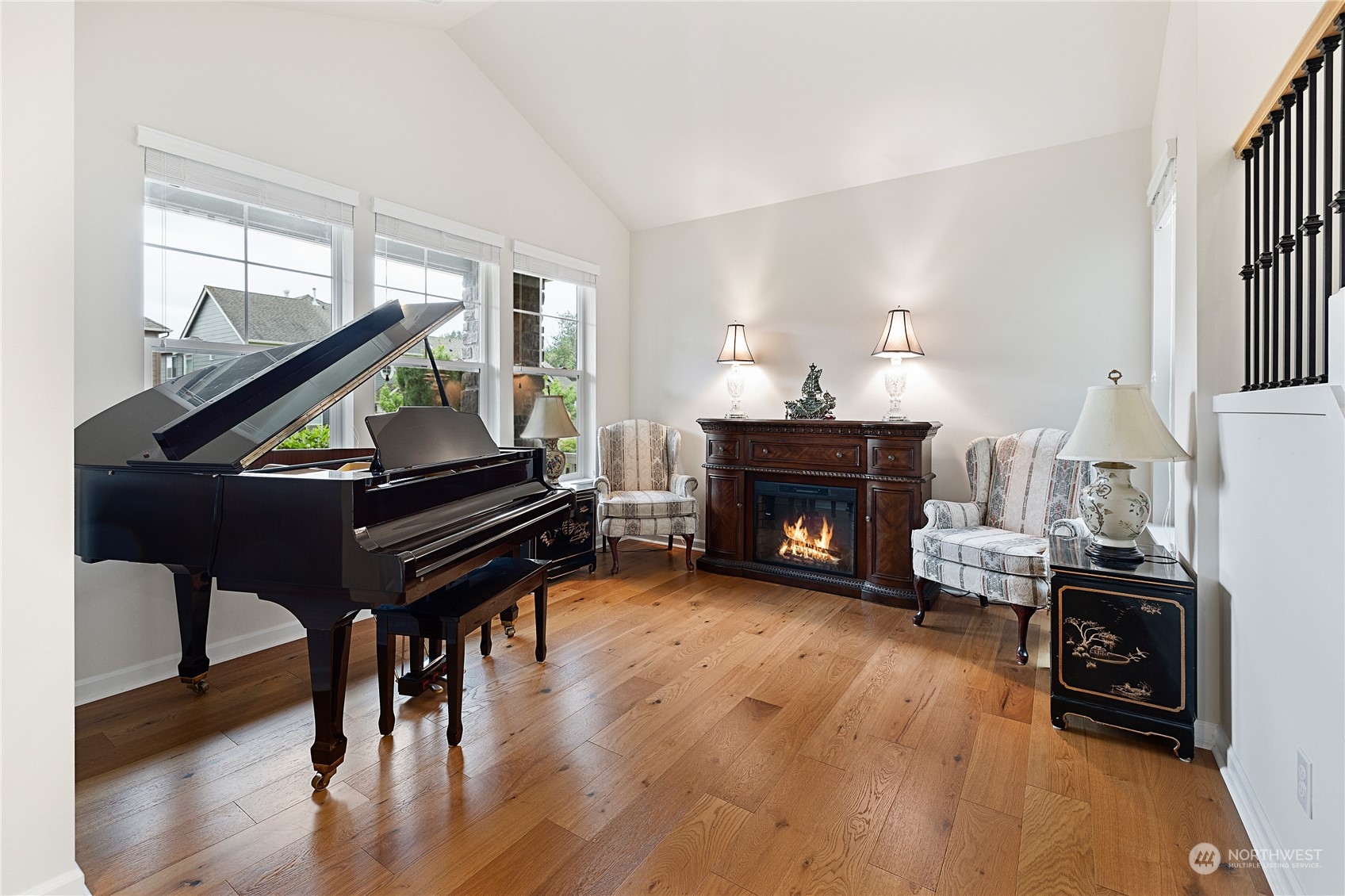 16224 Southeast 138th Place Renton, WA 98059 - Photo 4 of 40 a living room with furniture a fireplace and a piano