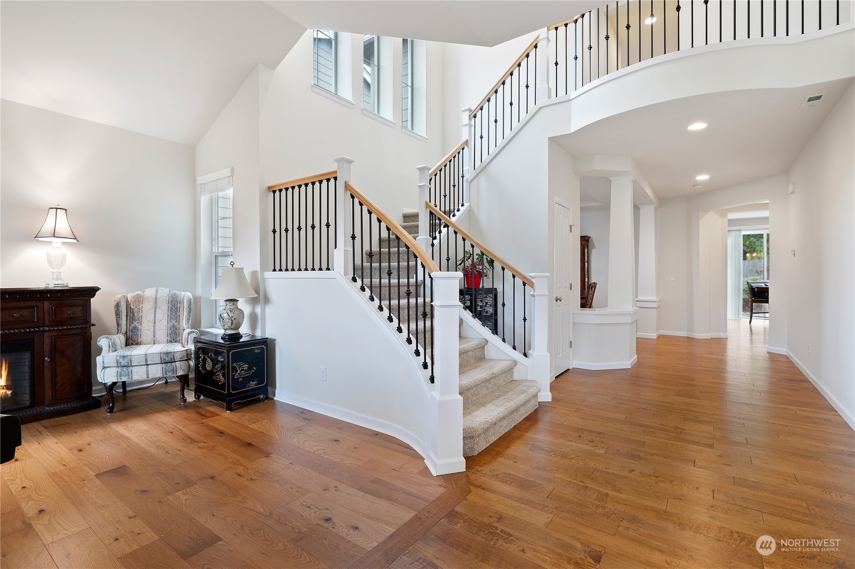 16224 Southeast 138th Place Renton, WA 98059 - Photo 5 of 40 a view of entryway and hall with wooden floor