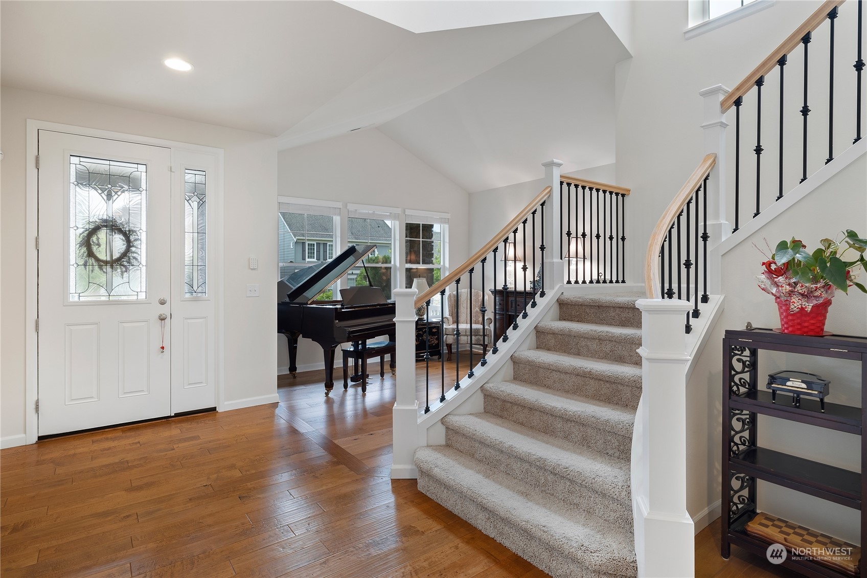 16224 Southeast 138th Place Renton, WA 98059 - Photo 6 of 40 a view of entryway and hall with wooden floor
