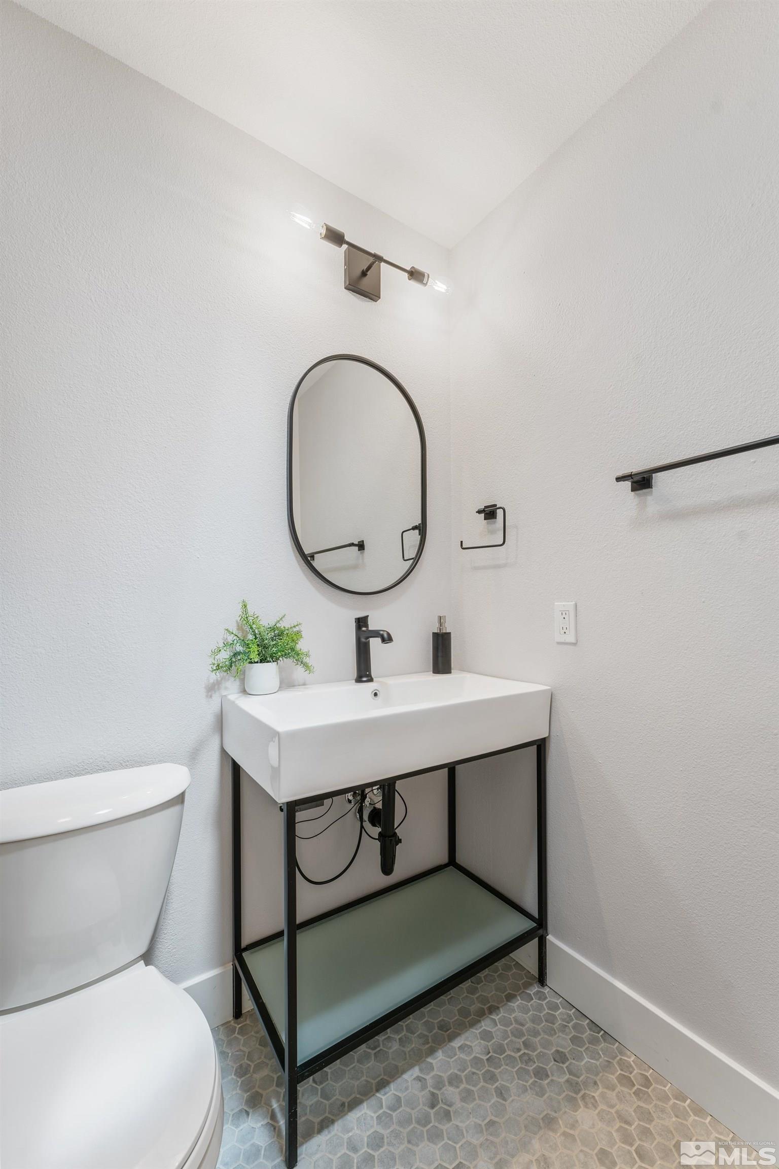 3380 Bryan Street Reno, NV 89503 - Photo 26 of 40 a view of a bathroom with a sink and a toilet