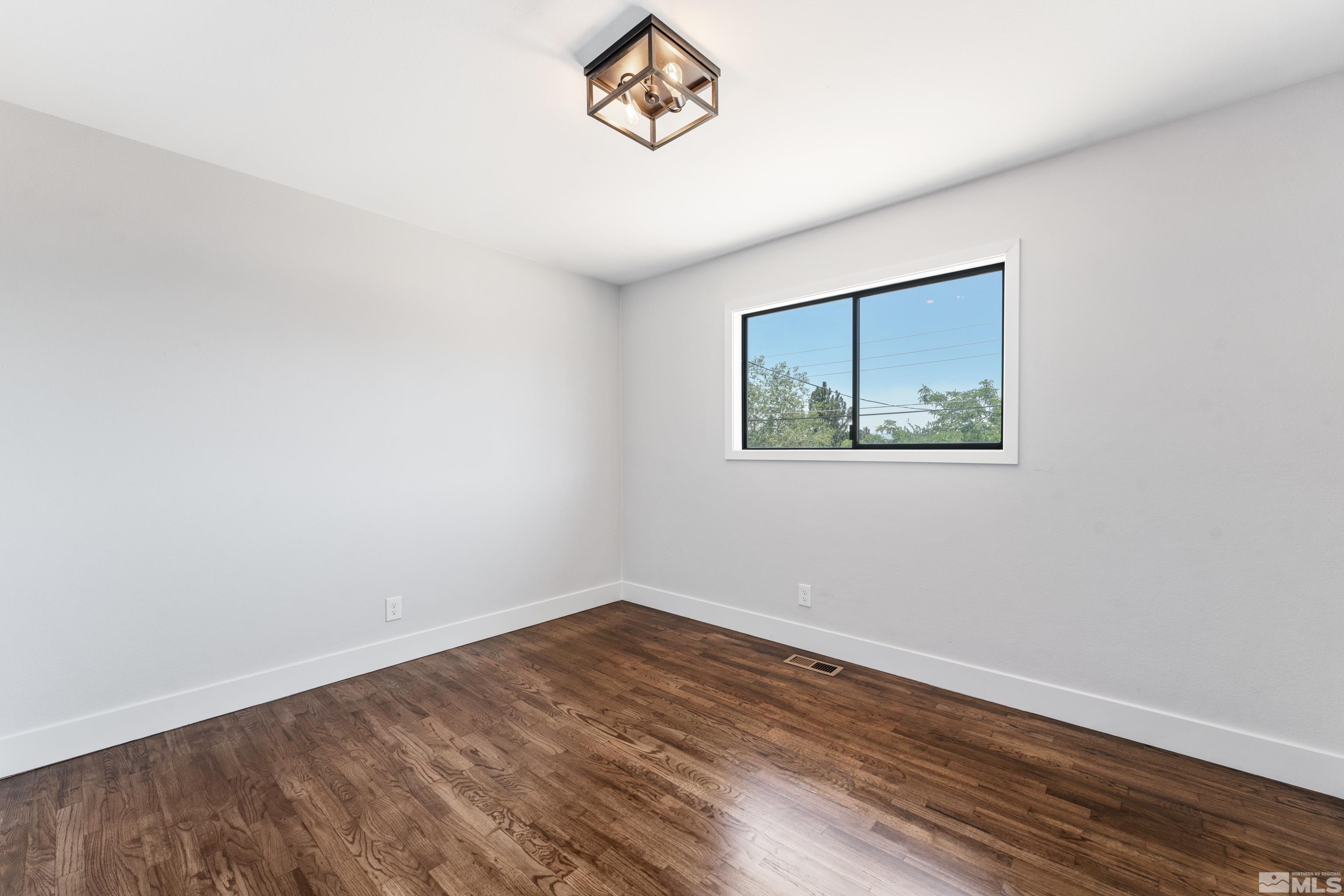 3380 Bryan Street Reno, NV 89503 - Photo 30 of 40 wooden floor in a empty room