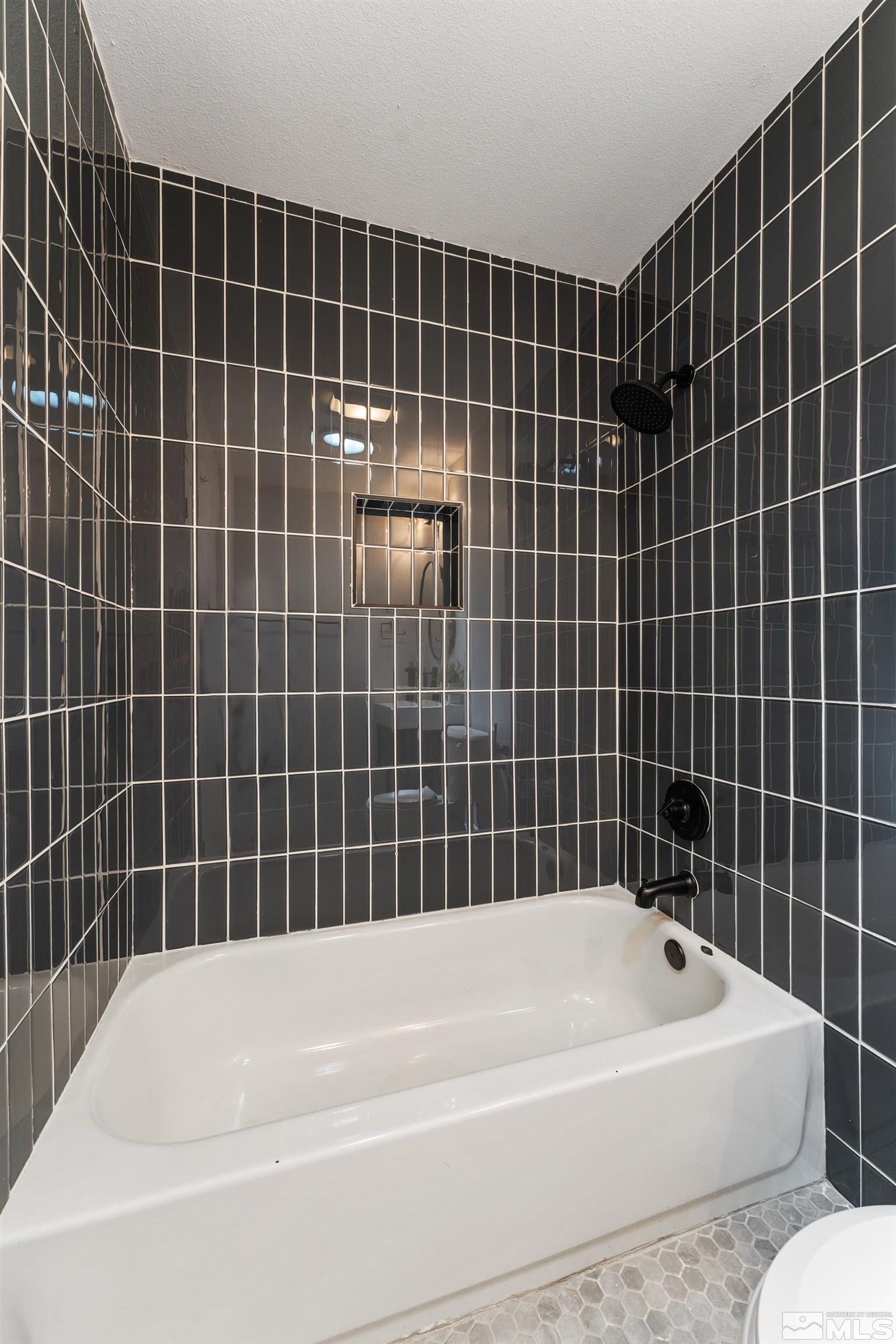 3380 Bryan Street Reno, NV 89503 - Photo 33 of 40 a bathroom with a bathtub