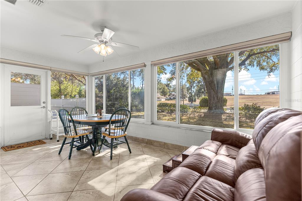 8962 Southwest 97th Street, Unit D Ocala, FL 34481 - Photo 21 of 56 a living room with furniture and a large window