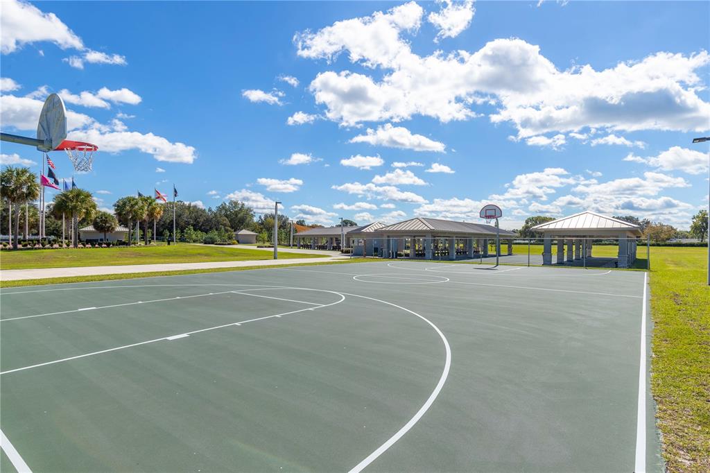 8962 Southwest 97th Street, Unit D Ocala, FL 34481 - Photo 50 of 56 a view of a tennis court