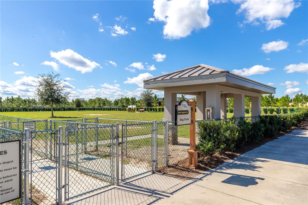 8962 Southwest 97th Street, Unit D Ocala, FL 34481 - Photo 54 of 56 a view of a house with a patio