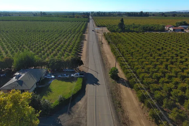 a view of a lake with a garden