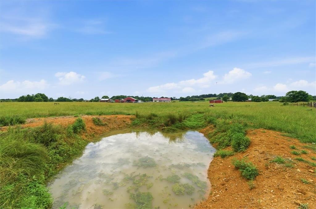 0 Plainview Road Southeast Adairsville, GA 30103 - Photo 15 of 40 a view of a lake with a big yard